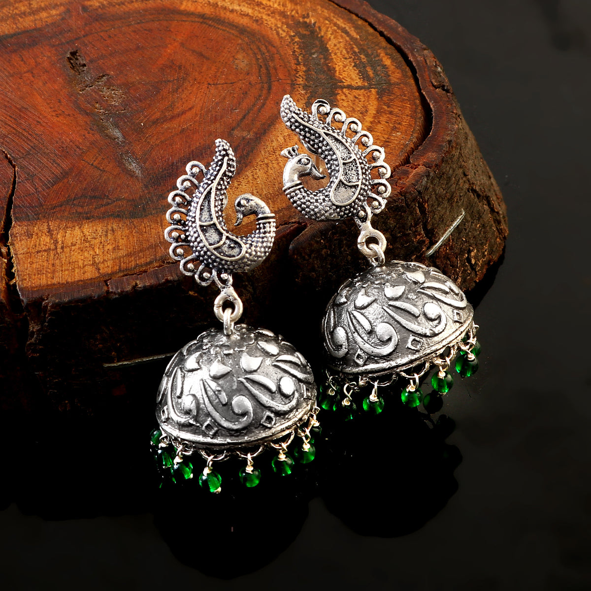 Oxidied 92.5 silver Jhumka earings threaded with natural pearls