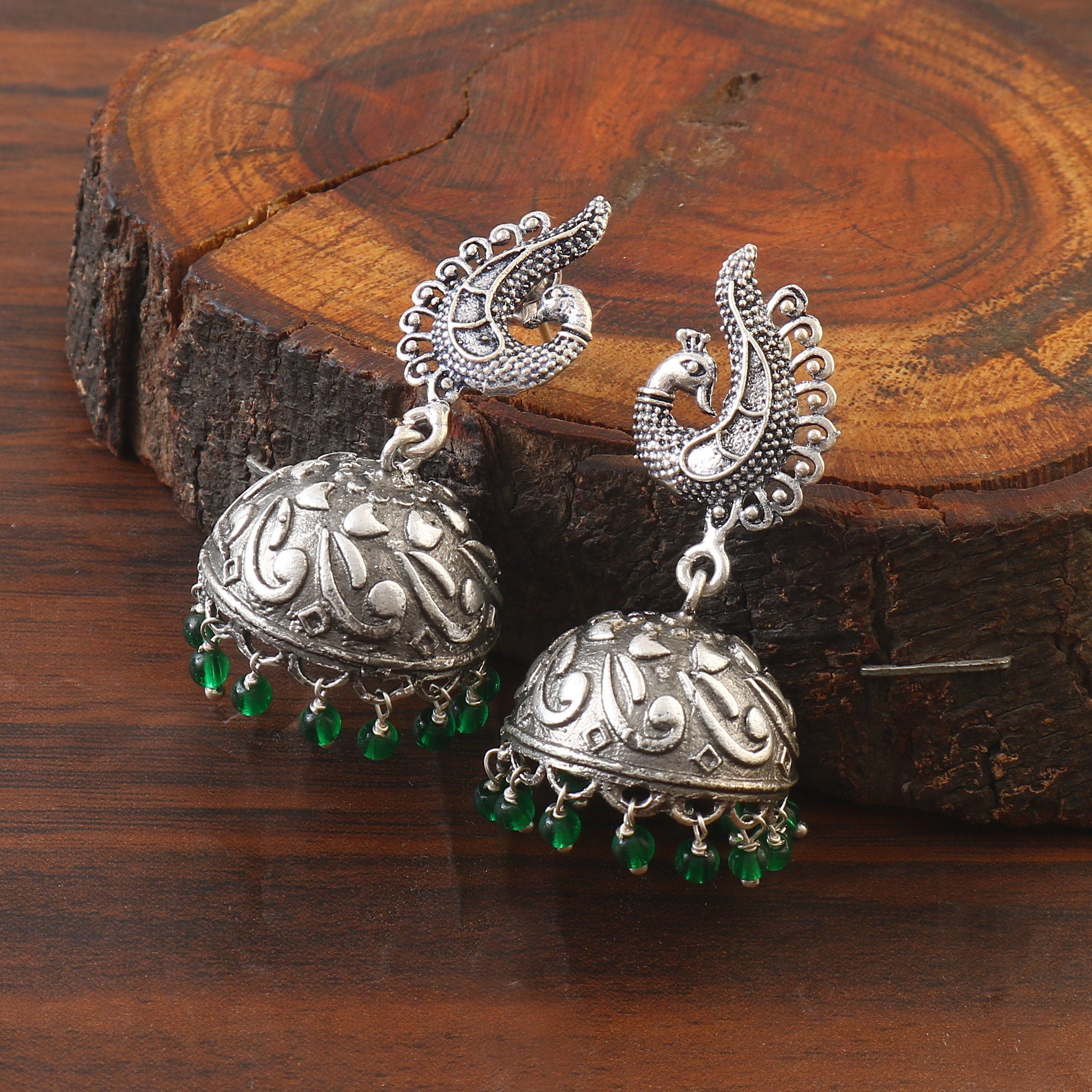 Oxidied 92.5 silver Jhumka earings threaded with natural pearls