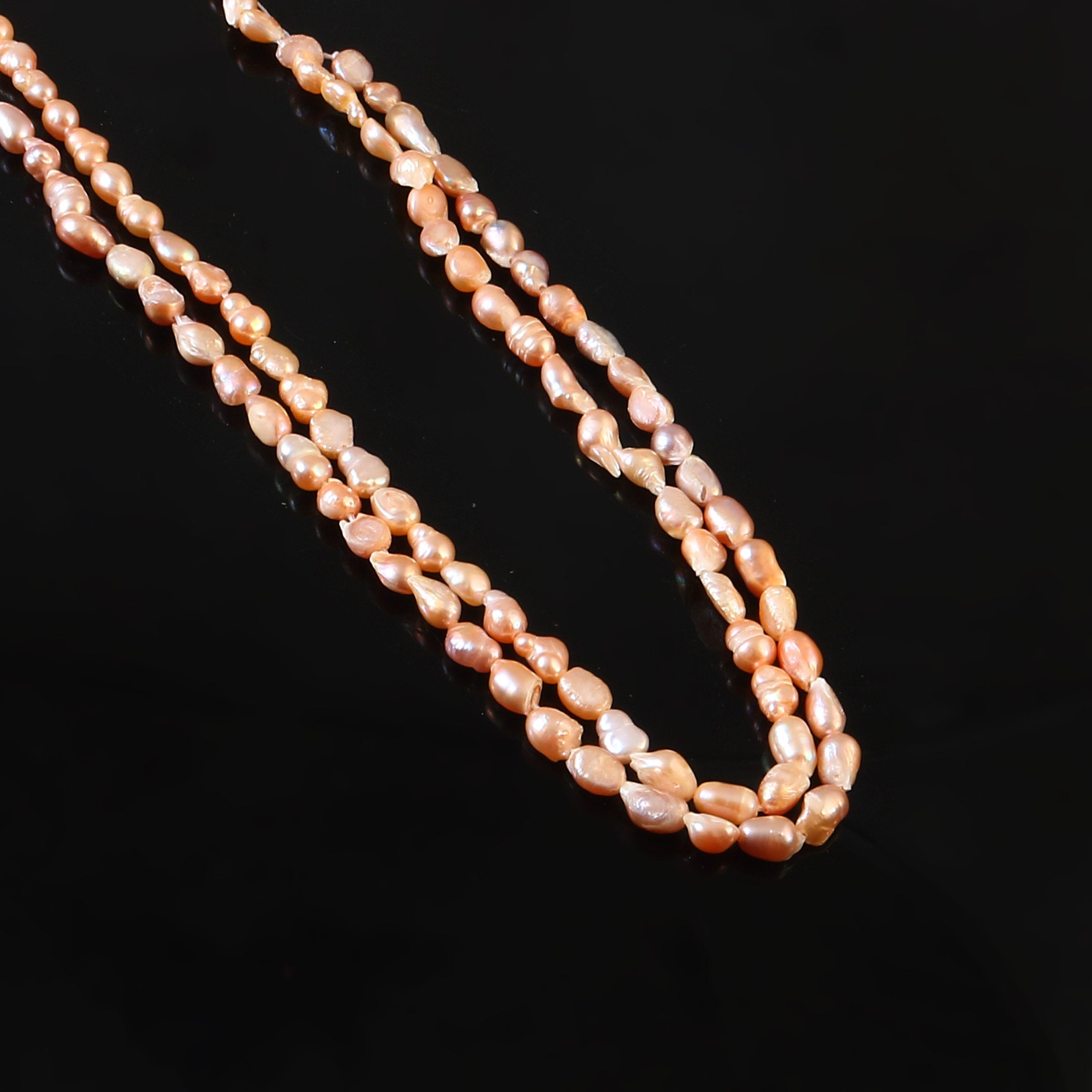 Fresh Water Pearl In Pink String